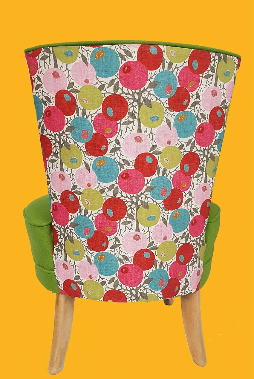 Re-upholstered chair in bright patterned fabric