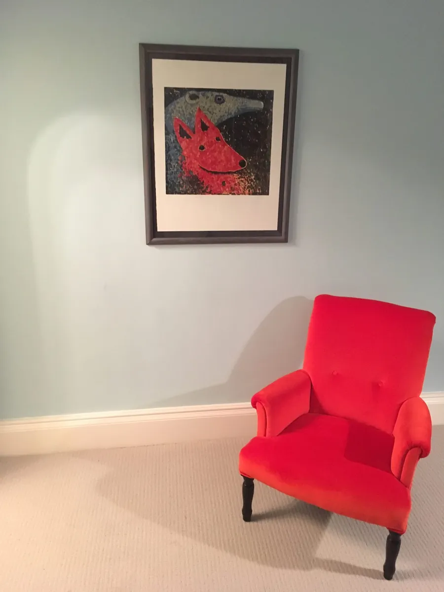 Chair being re-upholstered in the workshop